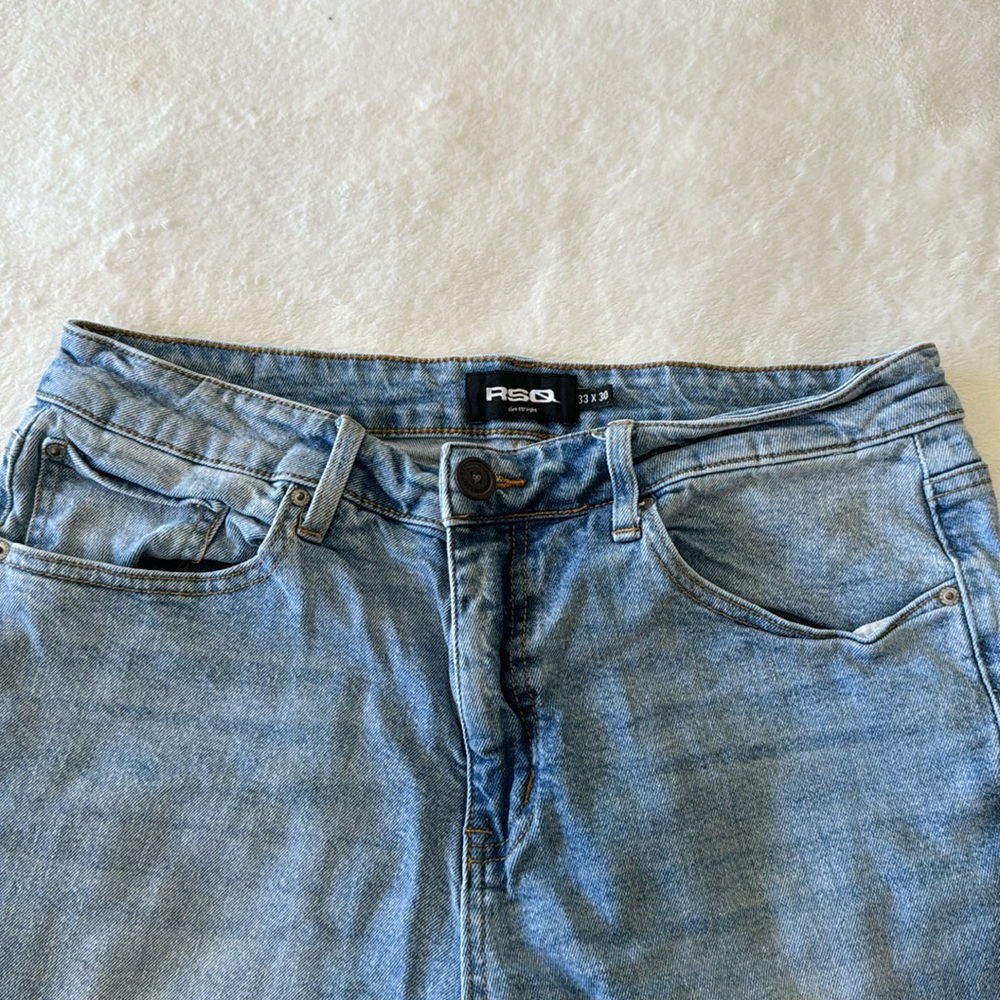 raw hem light denim jeans